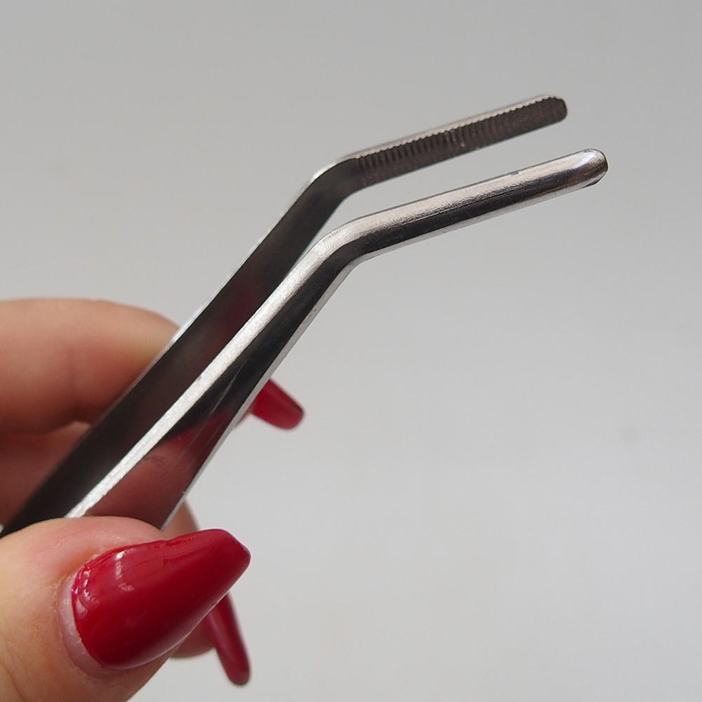Drapák a zahnutá pinzeta 22 cm - nerez