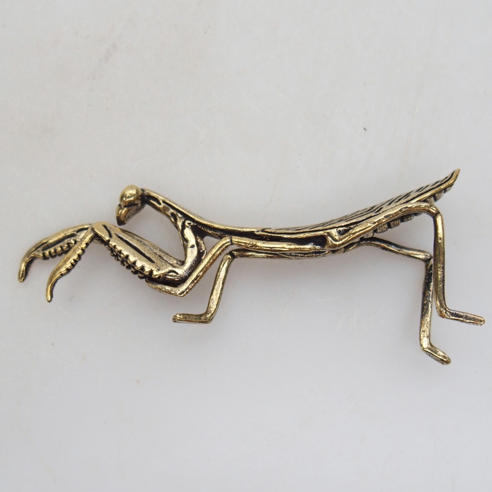 Kovová figurka - kudlanka