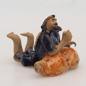 Keramická figurka - ležící mudrc