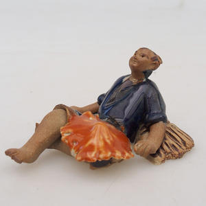 Keramická figurka - sběrač rýže
