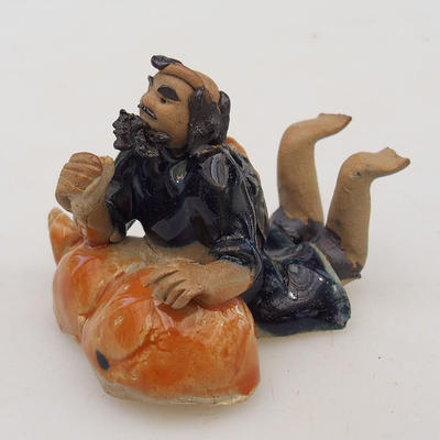 Keramická figurka - ležící mudrc - 2