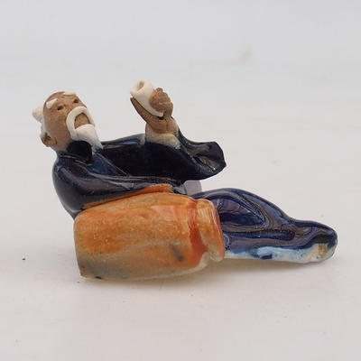 Keramická figurka - ležící mudrc - 2